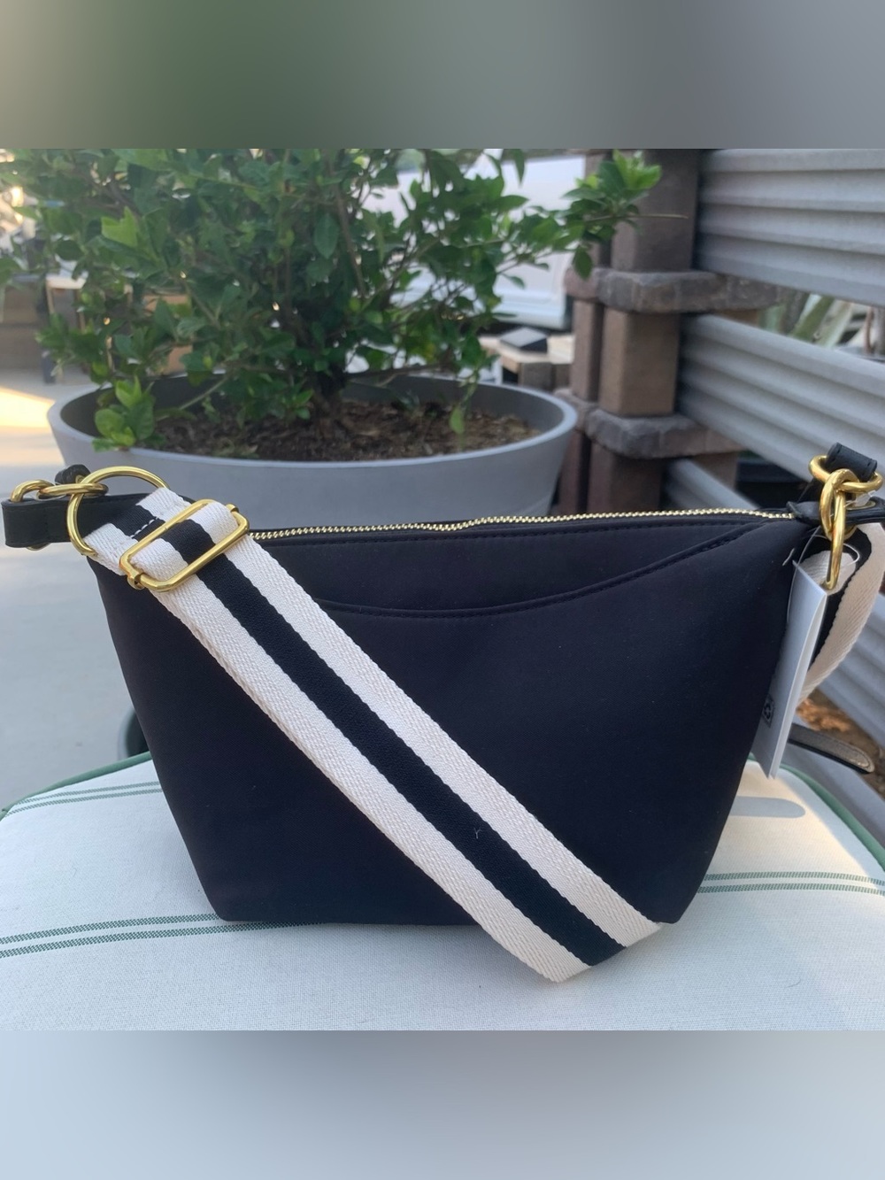 NWT Free Asembly Black Crossbody handbag with Striped Strap